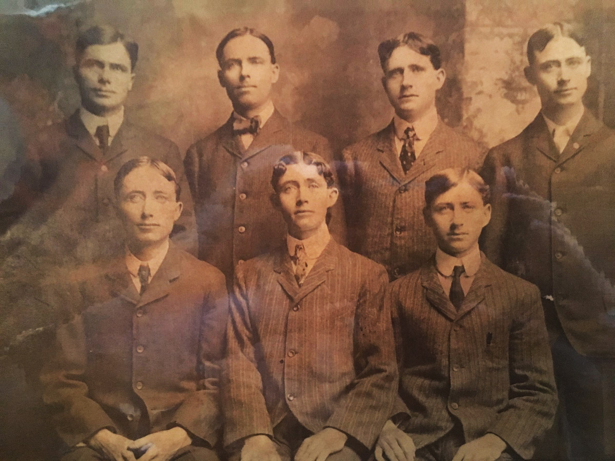 Antique photo of Seven O’Hara men, seated three in the front row, four in the rear, including James O’Hara (rear row, third from left).