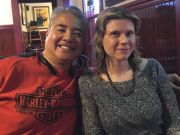 Joey deVilla and Anitra Pavka, sitting together and smiling in a booth at Kojak’s Ribs, Tampa, January 2016.