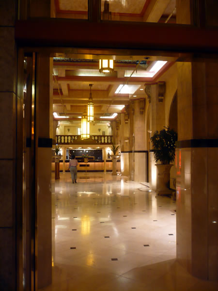 6. Hotel Cecil's marble lobby, looking in - The Adventures of Accordion