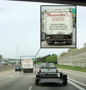 Moosejaw.com truck with the warning "Driver carries less that $50 in cash and is fully naked".