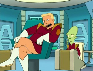 Zapp Brannigan sits in his captain's chair as Kif looks on