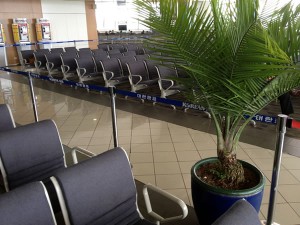"Velvet rope" cordoning off departure gate seating area at Ninoy Aquino International Airport