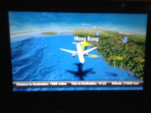 Cathay Pacific entertainment system map showing plane over Hong Kong