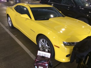 Photo: Joey deVilla's rental yellow Camaro and his accordion, side by side.