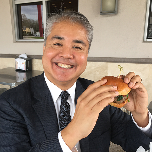 Joey deVilla eats a burger -- that most American of dishes -- after successfully acquiring a green card.