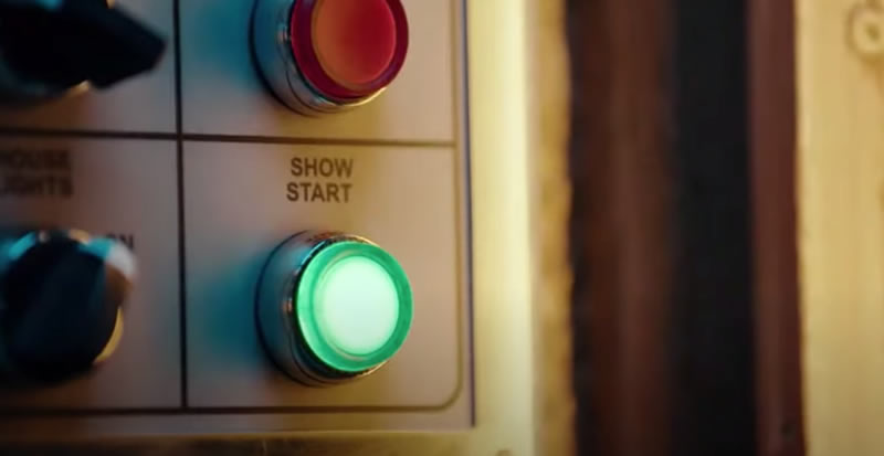 Photo: Close-up of the “SHOW START” button on the “ENCHANTED TIKI ROOM” control panel.