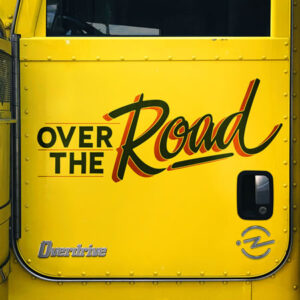 Photo: “Over the Road” podcast logo — Yellow truck door labeled “Over the Road”