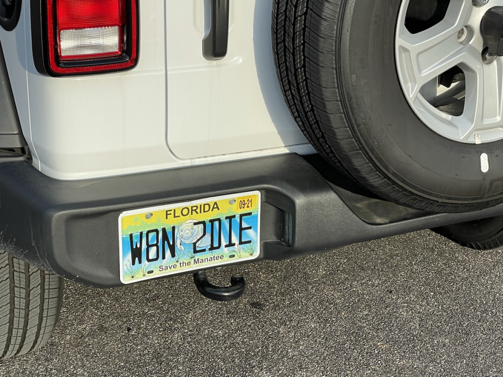Florida license plate on a white jeep: “W8N 2DIE”