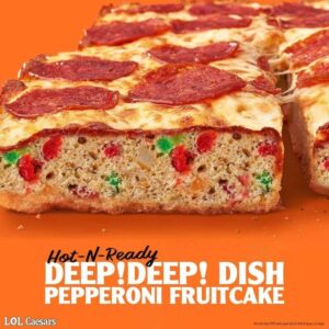 Fake “Little Caesars” ad for “Deep ! Deep! Dish Pepperoni Fruitcake”, featuring a fruitcake topped like a pepperoni pizza.